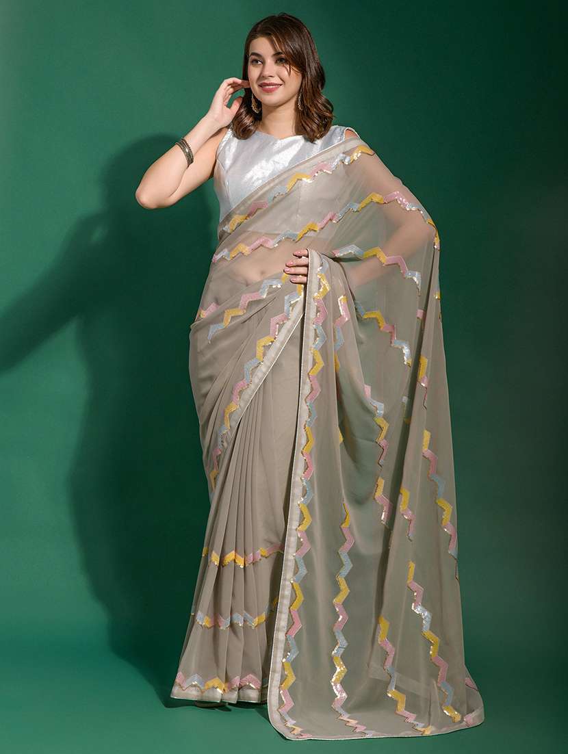 women solid with work embellished saree with blouse