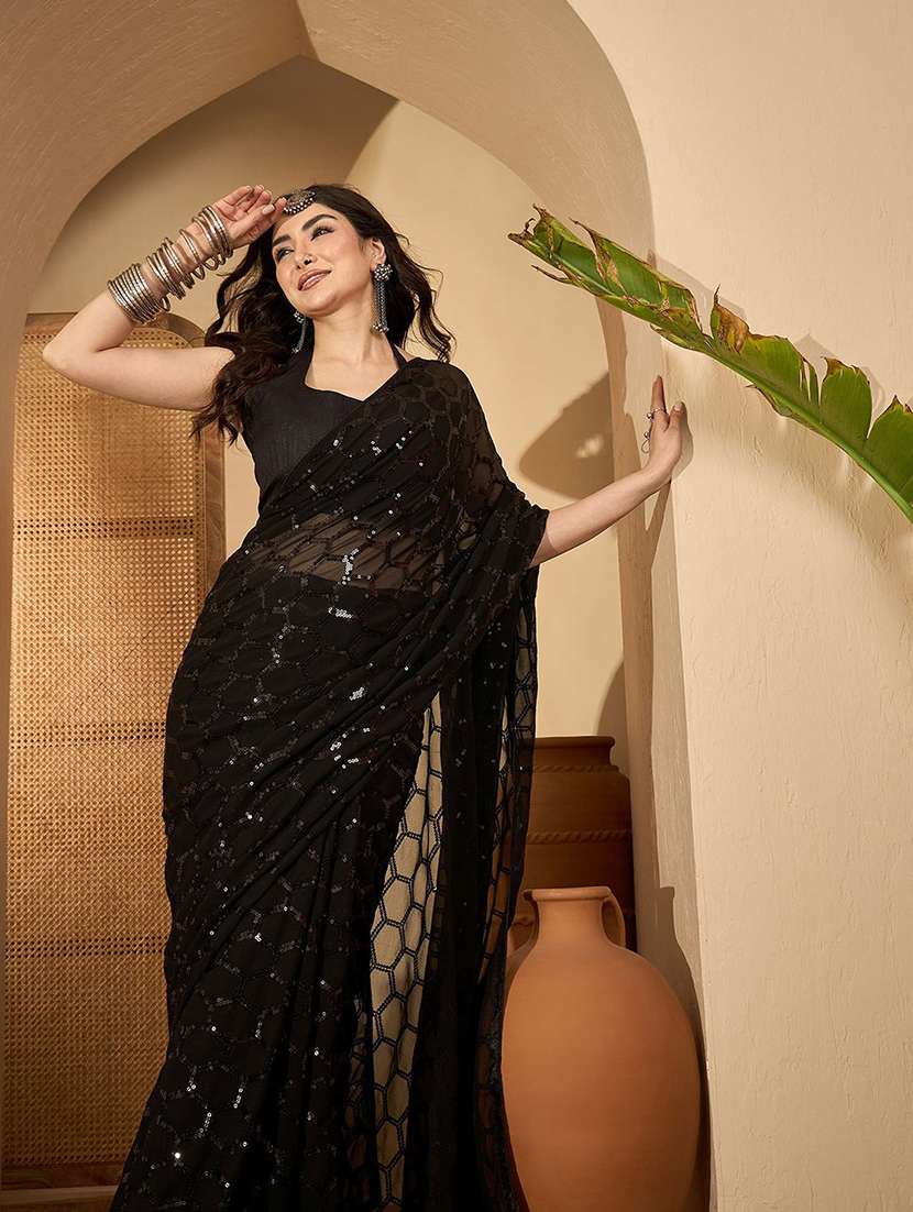 women solid with work embellished saree with blouse