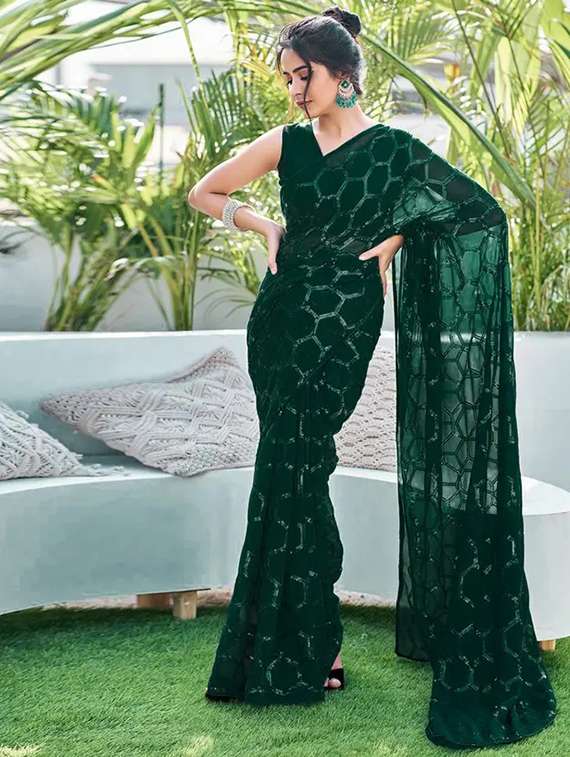 women solid with work embellished saree with blouse