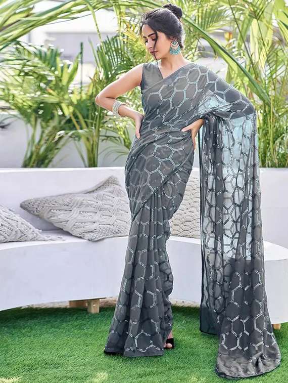women solid with work embellished saree with blouse