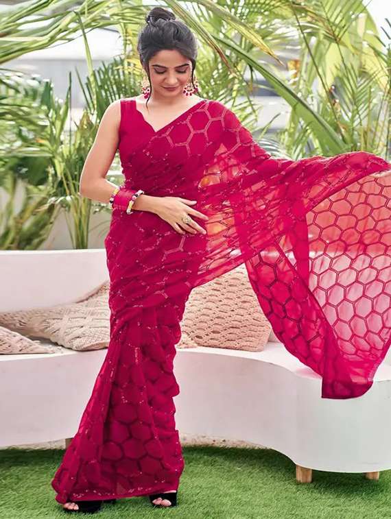 women solid with work embellished saree with blouse