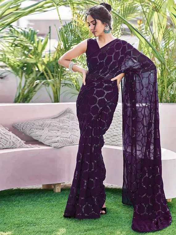women solid with work embellished saree with blouse