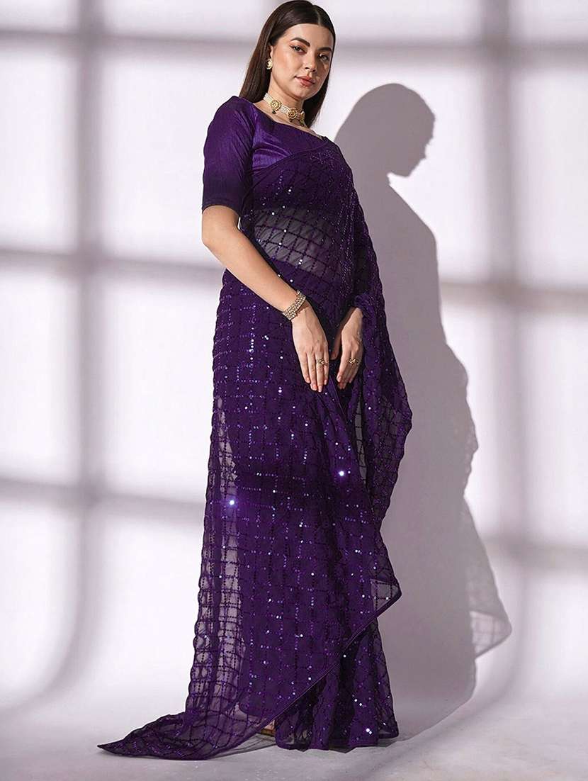 women solid with work embellished saree with blouse