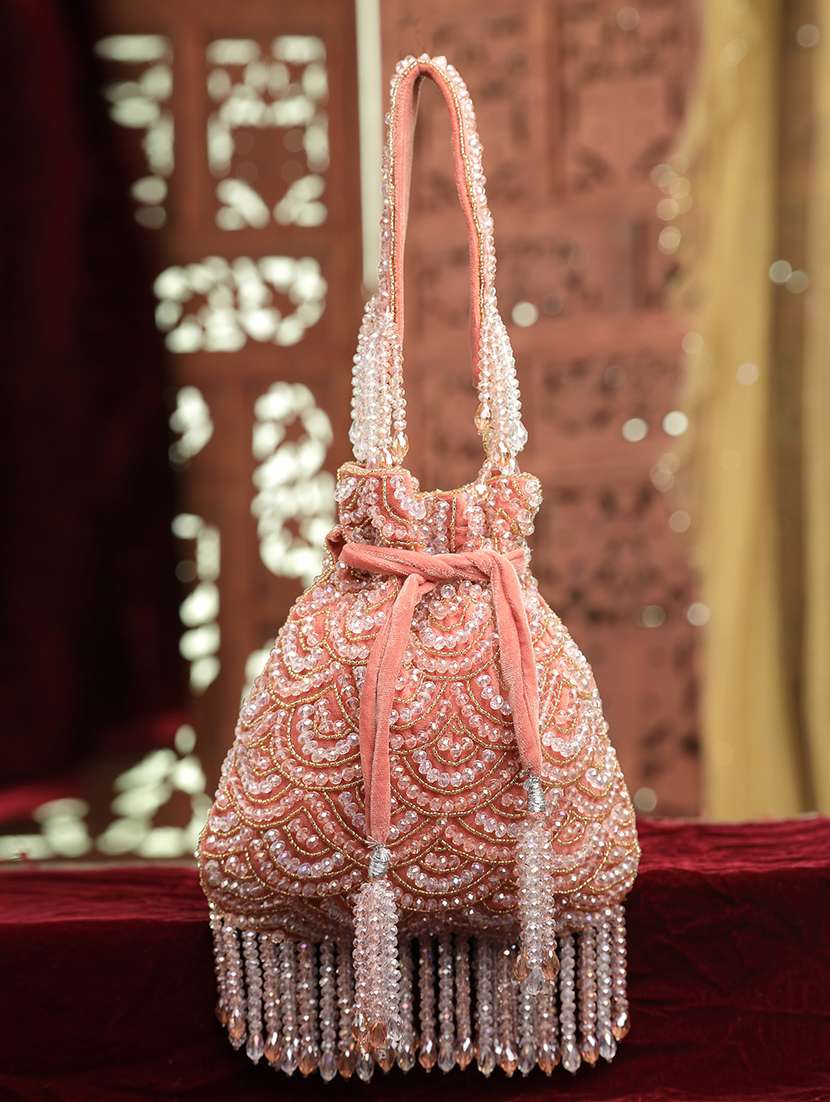 peach velvet embellished potli bag with drawstring closure