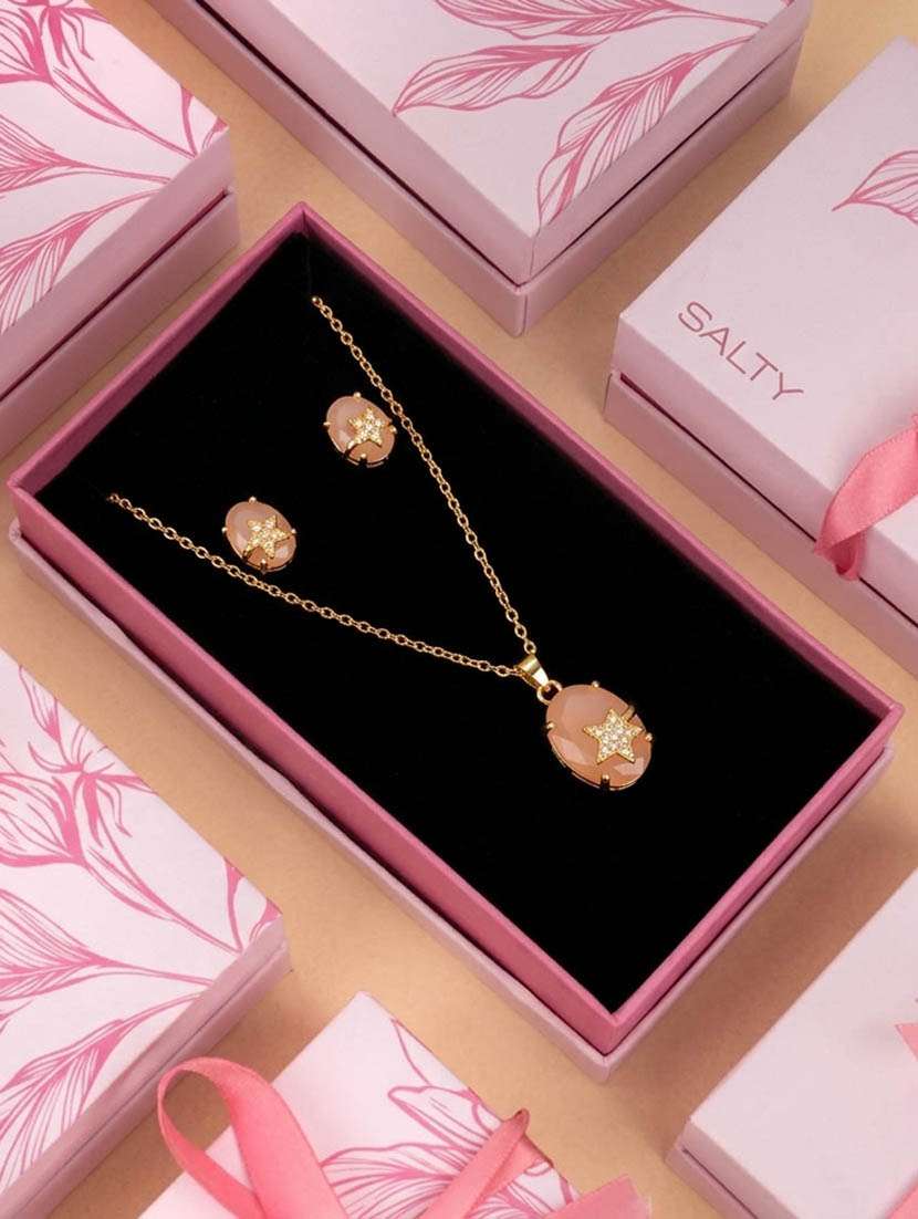 women pink stone necklace and earrings 