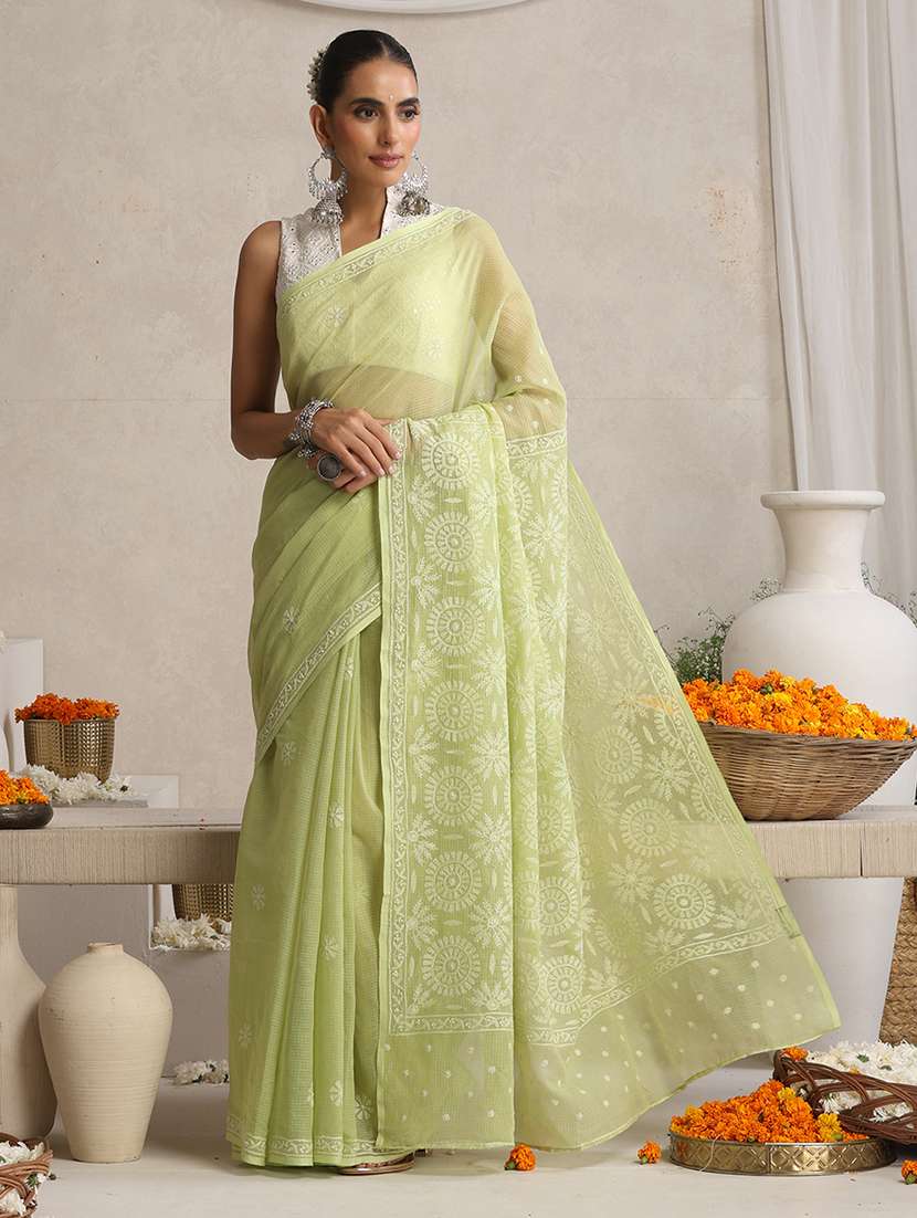 women solid with work embroidered saree