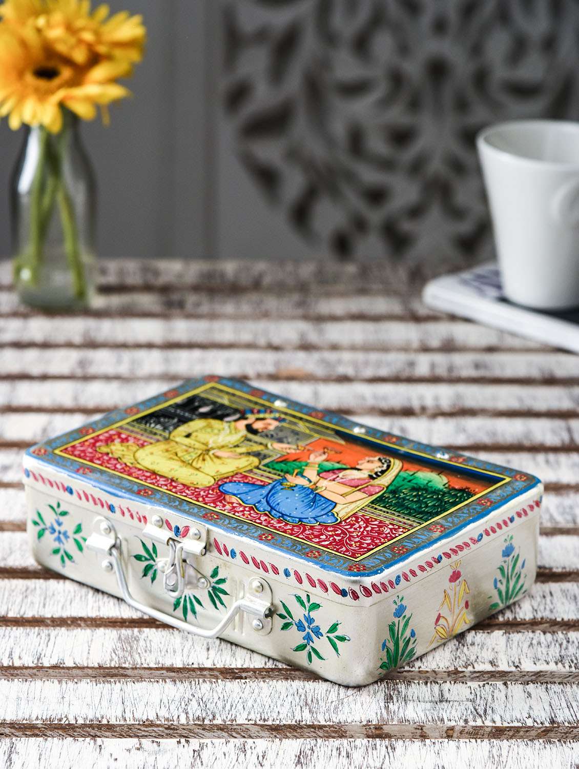 multicolored painted aluminum box