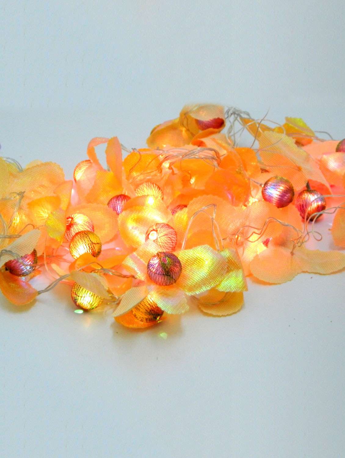 gold plastic flower string light