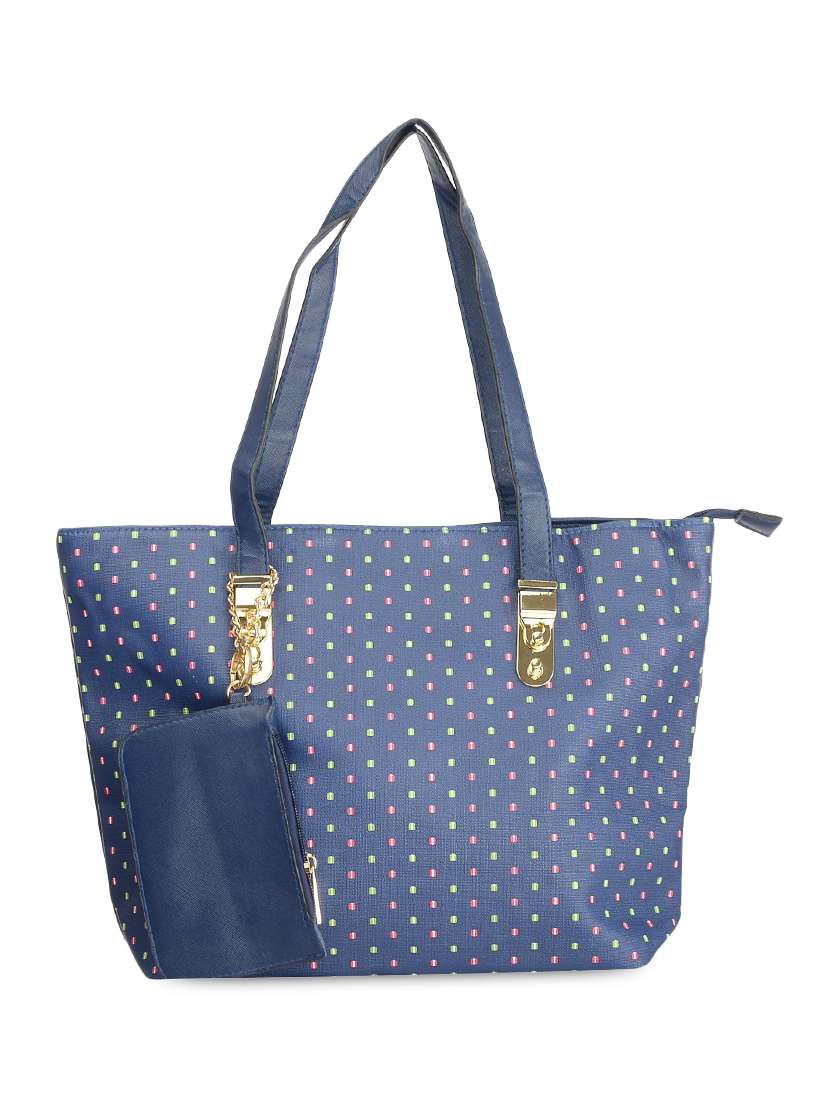 blue leatherette polka dotted handbag