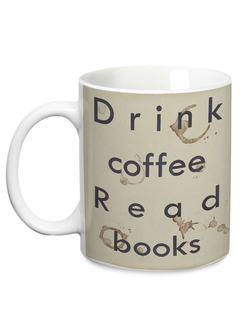 multicolored ceramic 'drink coffee read books' mug